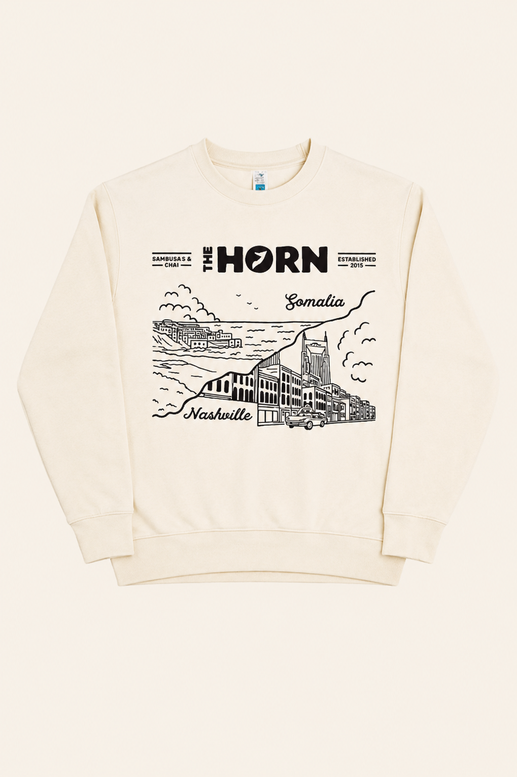 Beige sweatshirt with black graphic design on a white background