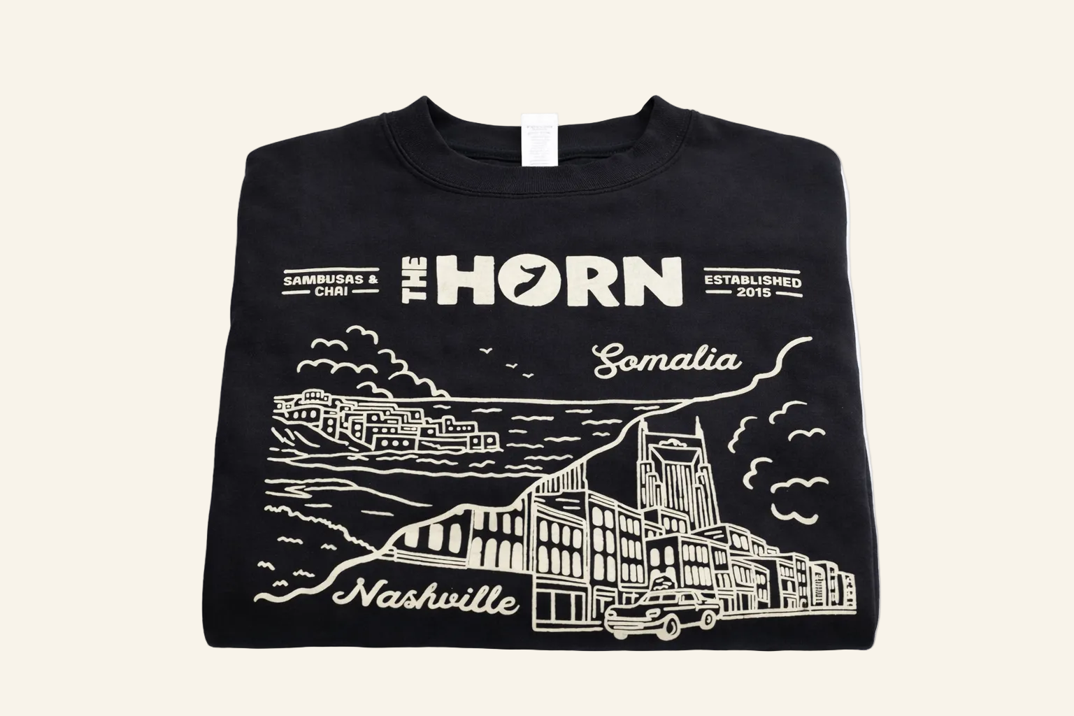 Black sweatshirt with white graphics and text on a white background